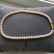 Graceful Cream Pearl Silhouette